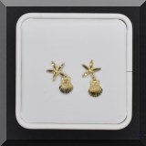 J02. 14K gold starfish and shell drop earrings. - $110